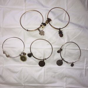 Set of 5 Alex + Ani bracelets.